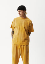 Afends Unlimited - Boxy Logo T-Shirt - Worn Mustard - Afends unlimited   boxy logo t shirt   worn mustard   streetwear   sustainable fashion